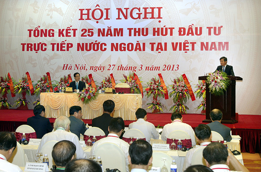 Bộ trưởng Bộ Kế hoạch và Đầu tư Bùi Quang Vinh phát biểu khai mạc hội nghị tổng kết 25 năm thu hút đầu tư trực tiếp nước ngoài, ngày 27/3. Ảnh: VGP/Nhật Bắc