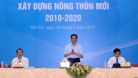 Thủ tướng Nguyễn Tấn Dũng dự và chỉ đạo Hội nghị sơ kết 3 năm thực hiện Chương trình mục tiêu quốc gia xây dựng NTM. Ảnh: VGP/Nhật Bắc