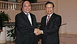 Phó Thủ tướng Nguyễn Xuân Phúc tiếp Phó Thủ tướng Lào