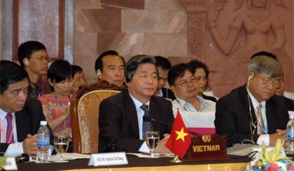 Bộ trưởng Bộ Kế hoạch và Đầu tư, Chủ tịch Ủy ban điều phối về Tam giác phát triển của Việt Nam Bùi Quang Vinh tại Hội nghị. (Ảnh: Xuân Khu/TTXVN