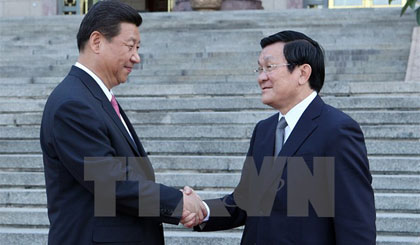 Chủ tịch Trung Quốc Tập Cận Bình đón Chủ tịch nước Trương Tấn Sang, trong chuyến thăm cấp Nhà nước, tháng 6-2013. Ảnh: Nguyễn Khang/TTXVN