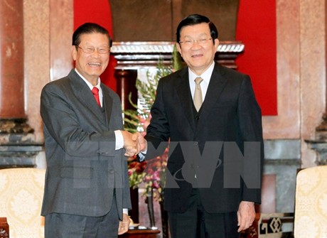 Chủ tịch nước Trương Tấn Sang và Phó Thủ tướng Somsavad Lengsavath. Ảnh: TTXVN