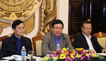 Phó Thủ tướng Phạm Bình Minh đánh giá cao sự phối hợp giữa 3 cơ quan trong năm qua. Ảnh: VGP/Hải Minh