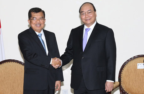 Phó Thủ tướng Nguyễn Xuân Phúc và Phó Tổng thống Indonesia Jusuf Kalla. Ảnh: VGP/Lê Sơn 