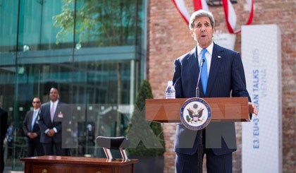 Ngoại trưởng Mỹ John Kerry có bài phát biểu về thỏa thuận quan trọng vừa đạt được trong tiến trình bình thường hóa quan hệ với Cuba. Ảnh: AFP/TTXVN