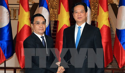 Thủ tướng Nguyễn Tấn Dũng hội đàm với Thủ tướng CHDCND Lào Thongsing Thammavong đang thăm và làm việc tại Việt Nam. Ảnh: Đức Tám/TTXVN