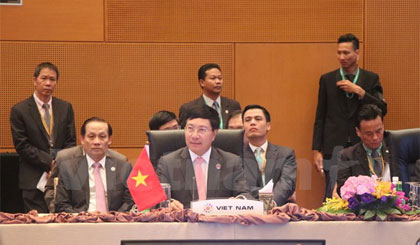 Thủ tướng, Bộ trưởng Ngoại giao Phạm Bình Minh tại Hội nghị Hội đồng APSC lần thứ 13. Ảnh: Kim Dung-Chí Giáp/Vietnam+