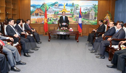 Chủ tịch nước Trần Đại Quang đến thăm và làm việc với lãnh đạo chủ chốt tỉnh Champasak. Ảnh: Nhan Sáng/TTXVN