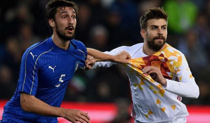 Tâm điểm vòng 1/8 sẽ là cuộc đối đầu giữa Italy và Tây Ban Nha. Nguồn: AP