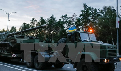 Xe quân sự của Ukraine trên một tuyến đường ở Kiev ngày 10-7. Nguồn: EPA/TTXVN