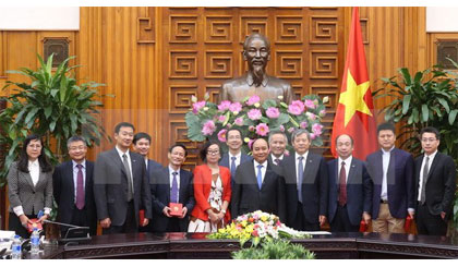 Thủ tướng Nguyễn Xuân Phúc với các đại biểu tại buổi tiếp. Ảnh: Thống Nhất/TTXVN