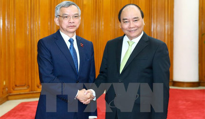 Thủ tướng Nguyễn Xuân Phúc tiếp ông Sommad Pholsena, Bộ trưởng Tài nguyên và Môi trường Lào đang thăm và làm việc tại Việt Nam. Ảnh: Thống Nhất/TTXVN