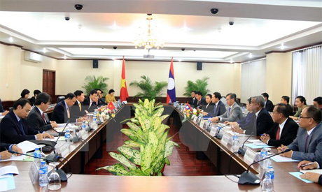 Quang cảnh buổi hội đàm giữa hai Bộ trưởng Ngoại giao Việt Nam và Lào. Ảnh: Phạm Kiên/TTXVN