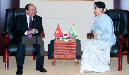 Prime Minister Nguyen Xuan Phuc and Myanmar State Counsellor and Foreign Minister Aung San Suu Kyi (Photo: VNA)