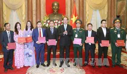 President Tran Dai Quang and delegates at the meeting (Photo: VNA)