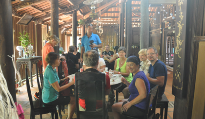 Foreign visitors at Dong Hoa Hiep ancient villiage in Cai Be district, Tien Giang province. Photo: Huu Chi