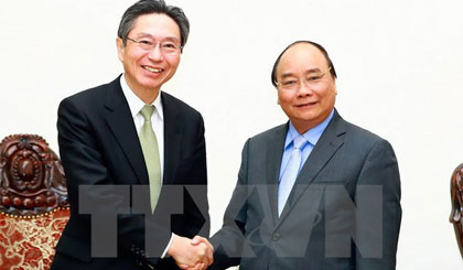 Thủ tướng Nguyễn Xuân Phúc tiếp ông Takashi Oyamada, Tổng giám đốc Ngân hàng BTMU. Ảnh: Thống Nhất/TTXVN