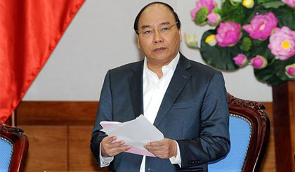 Thủ tướng Chính phủ Nguyễn Xuân Phúc tại phiên họp Chính phủ thường kỳ tháng 3-2017. Nguồn: VGP