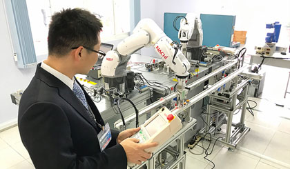 A Japanese expert from Toyooka Company test operation of the factory (Photo: SGGP)