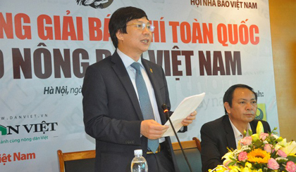 Hồ Quang Lợi, vice chairman of Việt Nam Journalists’ Association speaks at a ceremony held in Hà Nội to mark the launch of a contest “Vietnamese Farmers’ Pride” for journalist works. — Photo dantri.com Viet Nam News