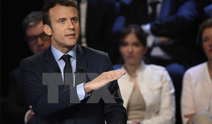 Ứng viên Tổng thống Pháp Emmanuel Macron trong cuộc tranh luận trên truyền hình ở La Plaine-Saint-Denis ngày 4-4. Nguồn: EPA/TTXVN