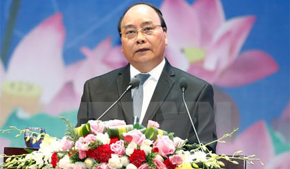 Thủ tướng Nguyễn Xuân Phúc chủ trì Hội nghị Thủ tướng Chính phủ với doanh nghiệp Đồng hành cùng doanh nghiệp năm 2017. Ảnh: Thống Nhất/TTXVN