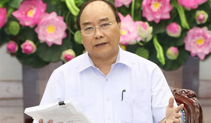 Thủ tướng Nguyễn Xuân Phúc chủ trì Phiên họp Thường trực Chính phủ bàn về các giải pháp thúc đẩy tăng trưởng năm 2017. Ảnh: Thống Nhất/TTXVN