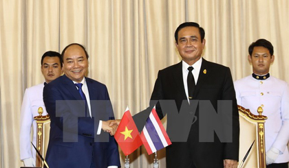 Thủ tướng Nguyễn Xuân Phúc và Thủ tướng Thái Lan Prayut Chan-o-cha. Ảnh: Thống Nhất/TTXVN