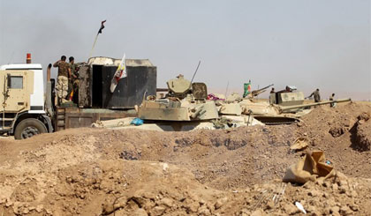 Lực lượng Iraq trên đường tiến vào thành phố Tal Afar ngày 21-8. Nguồn: AFP/TTXVN