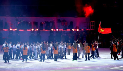 The Vietnamese delegation at the closing ceremony of the 29th SEA Games (Photo:  VNA)