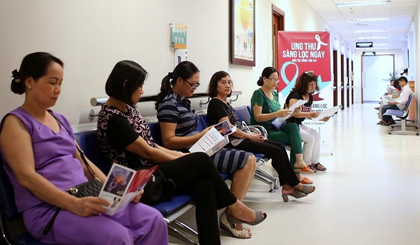 Local people wait for their turn for a screen for breast, cervical and colorectal cancer at Hanoi’s Vinmec Times City Hospital under a free cancer screening programme launched from September 9 to October 18.