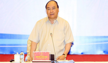 Thủ tướng Nguyễn Xuân Phúc phát biểu tại buổi đối thoại. Ảnh: Thống Nhất/TTXVN