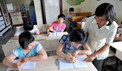 A class for students with disabilities (Photo: VNA)