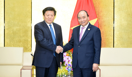  Thủ tướng tiếp Chủ tịch Tập đoàn Lưới điện phương Nam của Trung Quốc Lý Khánh Khôi. Ảnh: VGP/Quang Hiếu