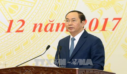  President Tran Dai Quang speaks at the conference. (Photo: VNA)