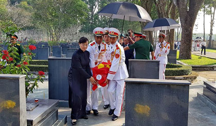 A reburial ceremony for martyr remains in HCM City (Photo: VNA)