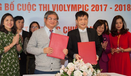 Đại diện FPT và Viện Khoa học Giáo dục Việt Nam ký kết thỏa thuận hợp tác. Ảnh: FPT