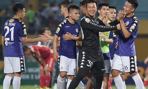 Hanoi FC players celebrate with joy. (Photo: NDO/Tran Hai)