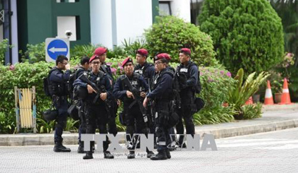 Cảnh sát Singapore gác tại khu vực gần khách sạn Shangri-La. Nguồn: AFP/TTXVN