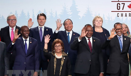 Thủ tướng Nguyễn Xuân Phúc và các trưởng đoàn G7 và G7 mở rộng. Ảnh: Thống Nhất/TTXVN