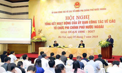 The meeting of the Committee for Foreign Non-Governmental Organisation Affairs in Hanoi on July 5 (Photo: VNA)