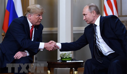 Tổng thống Nga Vladimir Putin (phải) và Tổng thống Mỹ Donald Trump tại hội nghị thượng đỉnh ở Helsinki, Phần Lan ngày 16-7 vừa qua. Ảnh: AFP/TTXVN
