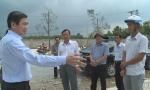 Chairman of the PPC Le Van Huong inspects the actual construction works