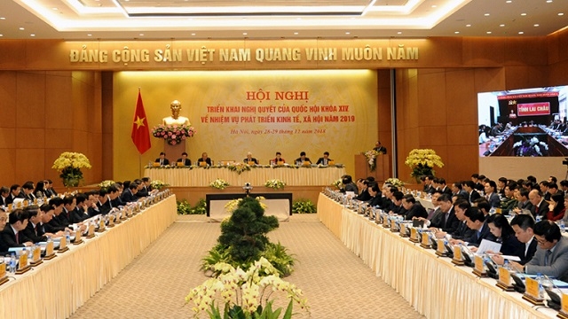 Party and State leaders hosted a national teleconference between the Government and 63 provinces and cities nationwide in Hanoi on December 28. (Photo: NDO/Tran Hai)