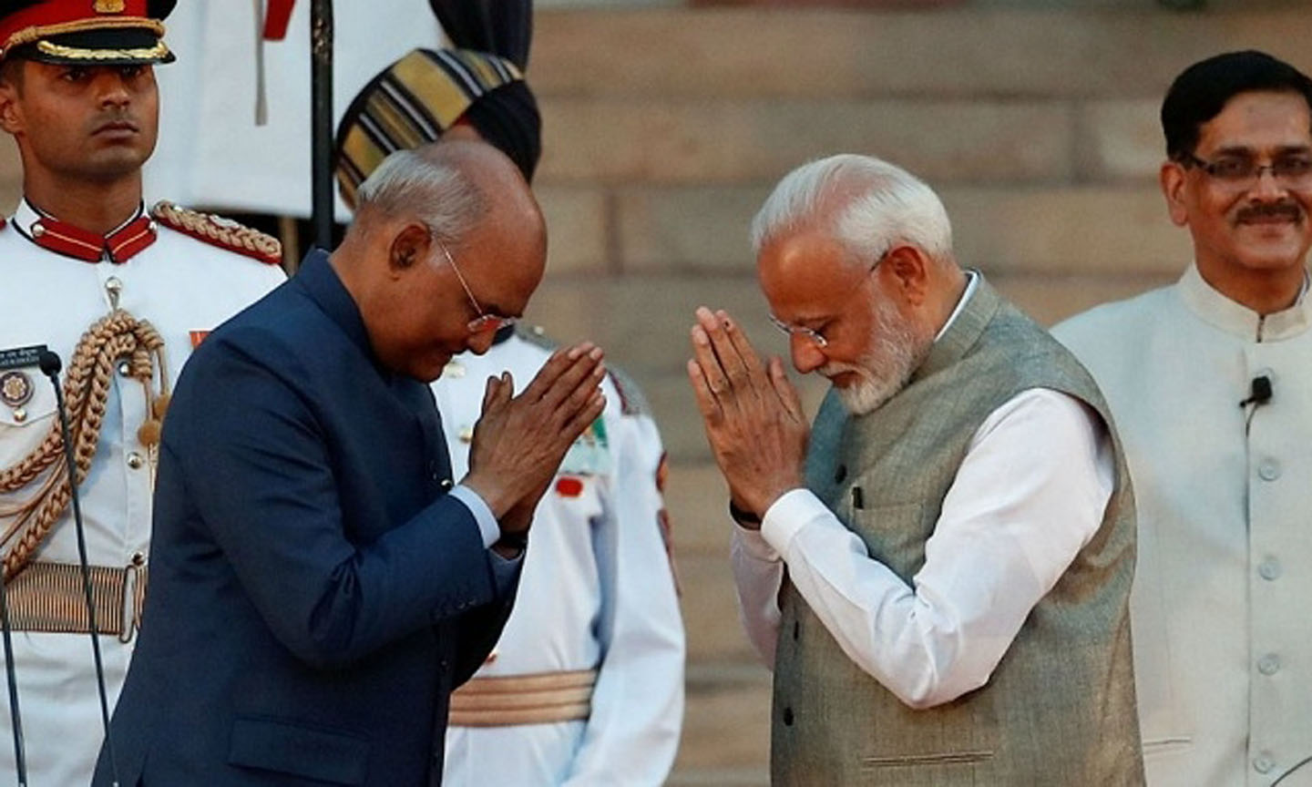 President Ram Nath Kovind (L) attends Narendra Modi’s swearing-in ceremony in New Delhi. (Reuters)