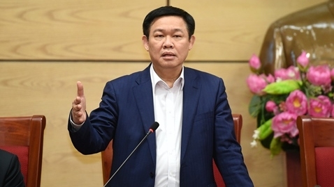Deputy PM Vuong Dinh Hue speaking at the conference (Photo: VGP)