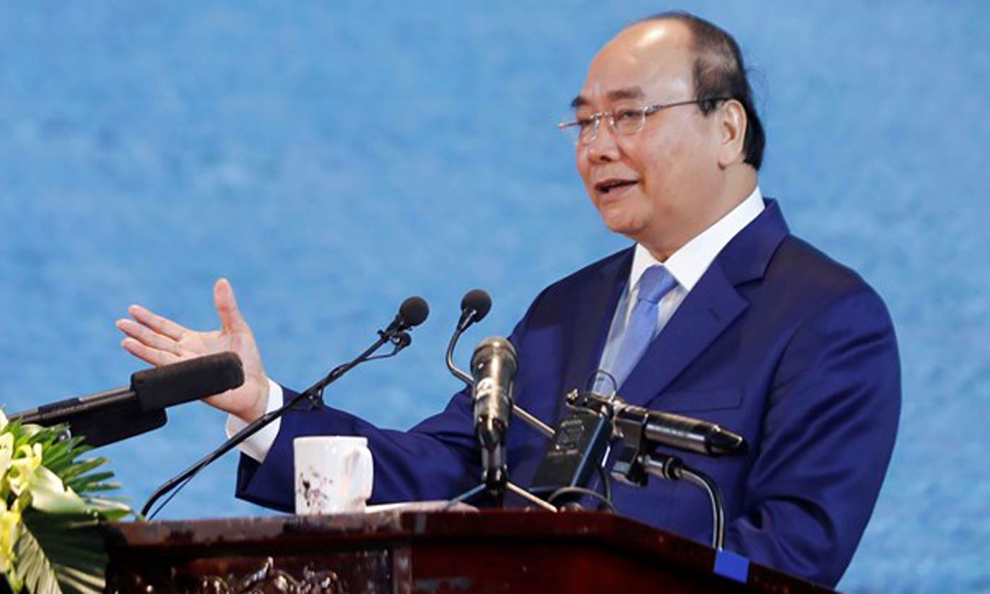 Prime Minister Nguyen Xuan Phuc delivers a speech at the national conference in Nam Dinh province on October 19 (Photo:VNA)