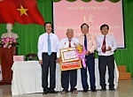 Secretary of the Provincial Party Committee Nguyen Van Danh presents Party membership badge