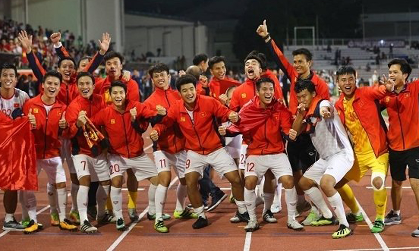 Young Vietnamese players celebrate after winning the historic gold medal at SEA Games 2019.