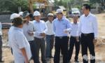 Chairman of the PPC Le Van Huong checks the basic construction works